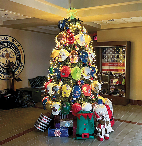 Local 16 members volunteered for Ritzy’s Fantasy of Lights, which featured a hard hat memorial tree for brothers who have passed.