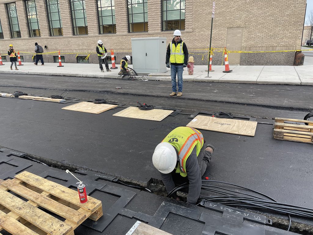 Members of Detroit Local 58 successfully installed the first EV charging road in North America, paving the way for the next era in electric vehicle infrastructure. “The buzz around Detroit has been the renaissance of the Motor City as an electric vehicle hub, and this is one more piece of it,” Local 58 Business Representative Byron Osbern said.