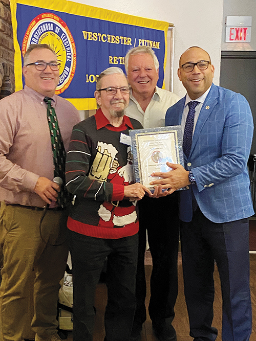 From left, Local 3 Business Agent Richard McSpedon, award recipient Albert Micka, Retirees’ Club Chairman Steve DiDonato and Business Agent Louis Sanchez.