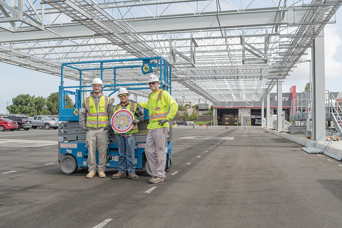 From left, Eric Parker, Jesus Medina and Casey Cox were part of a crew of San Diego Local 569 members that built a zero-emissions bus charging station.