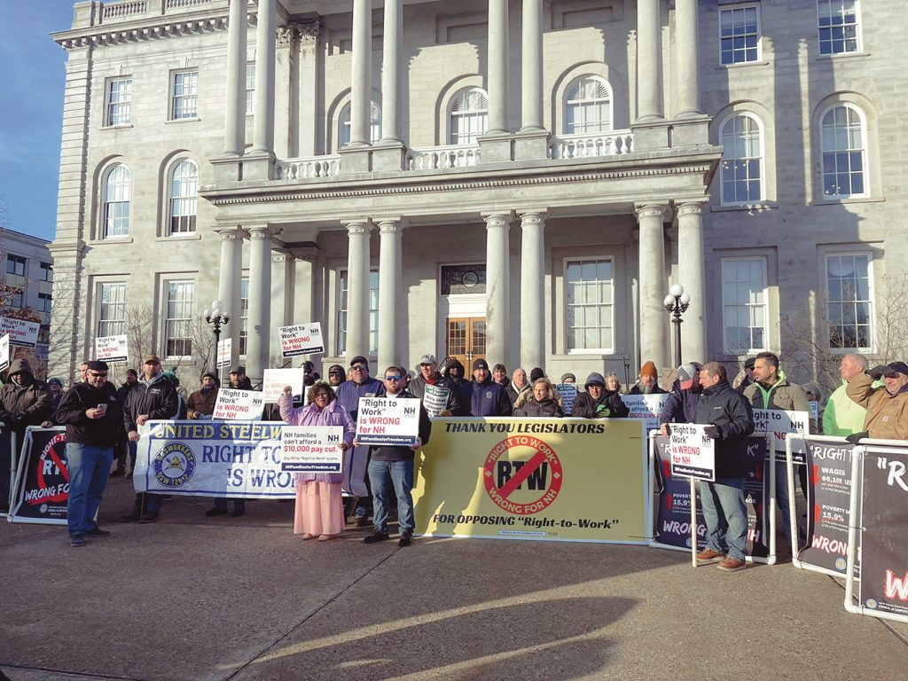 New Hampshire union members rally outside the Capitol in Concord to urge arriving legislators to vote “no” on right-to-work.