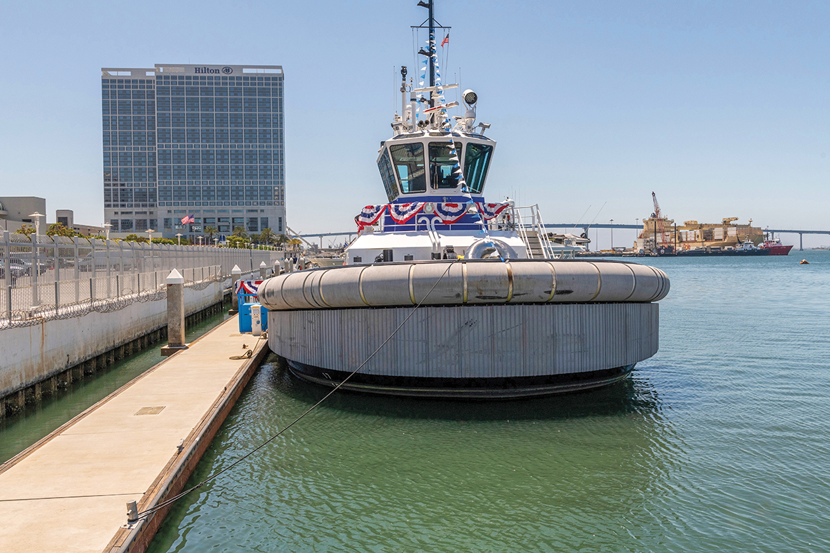 Members of San Diego Local 569 built a shoreside microgrid charging station for Crowley Marine Services’s eWolf, the first fully electric tugboat in the U.S. Photo courtesy of Brian Campbell, Local 40