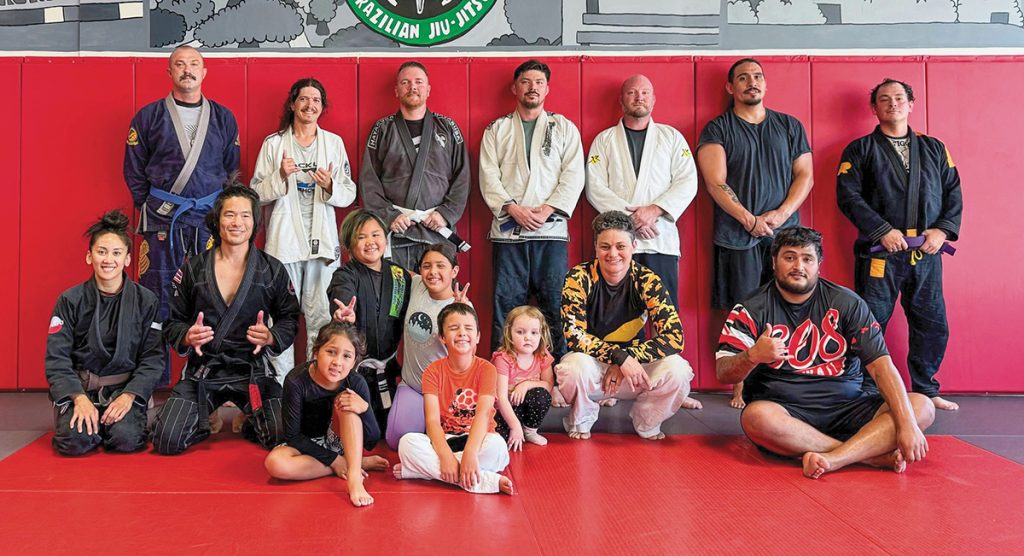 Brazilian jiu-jitsu black belt and inside wireman Troy Takara, second from the left kneeling, has brought his love of the sport to Sacramento, Calif., Local 340, and the new club is taking off. “Anything that brings our members together outside the workplace makes all of us stronger,” Business Manager Bob Ward said.