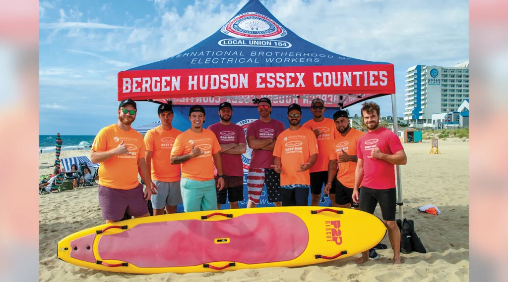 Brother Ivan Zhirnov (far right) and Local 164 brothers help the Best Day Foundation to bring the beach fun.