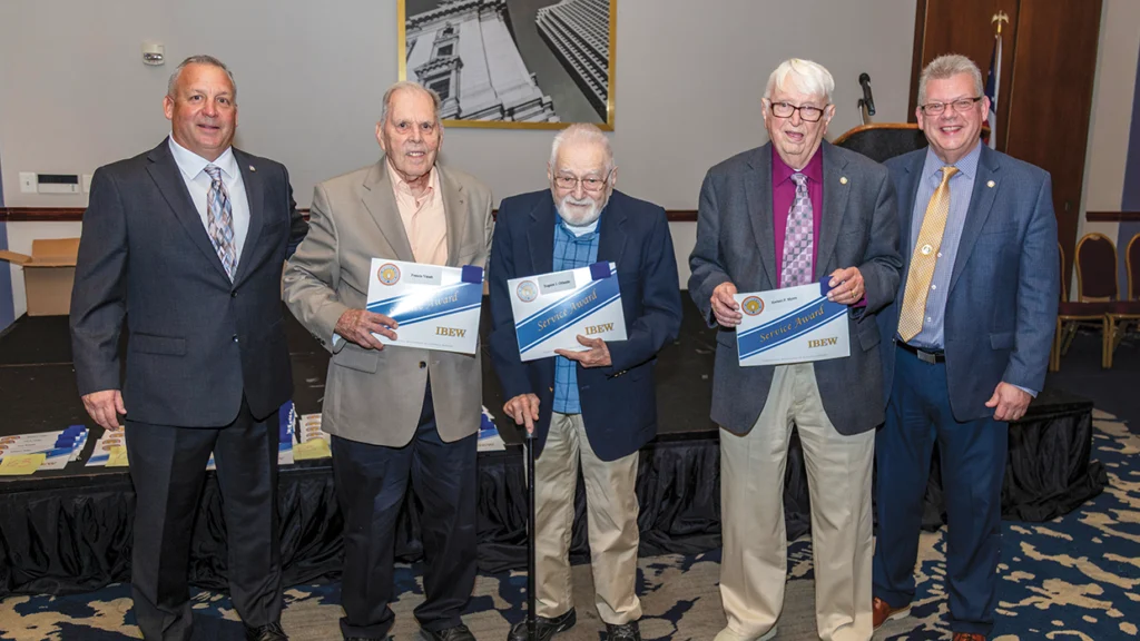 Frank Vanah, Eugene Orlando and Herb Meyers with Local 38 Business Manager Dan Gallagher and President Michael Muzic after receiving their 70-year service awards.