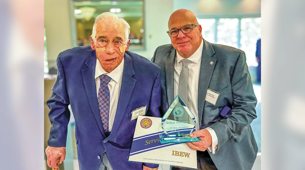 Local 309’s 70-year member Arlen Juergens and Business Manager Chris Hankins.