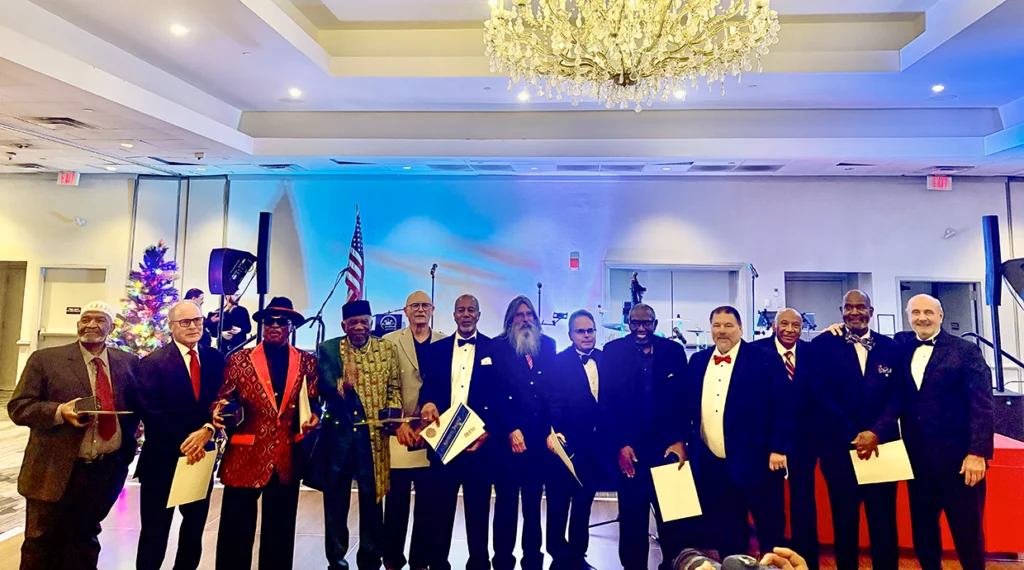 Local 164 Business Manager Dan Gumble and President Tom Sullivan honor the local’s retirees.