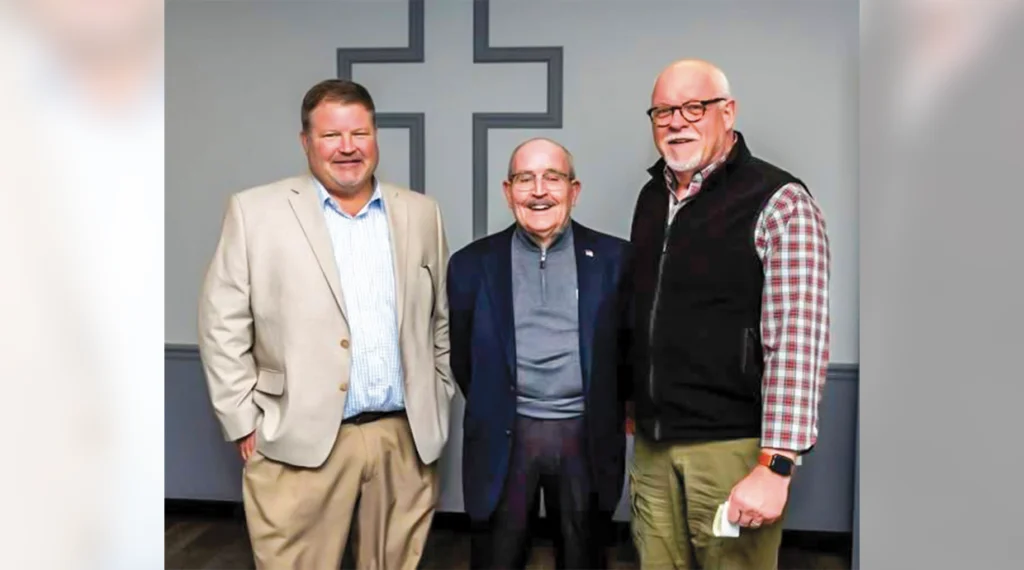 From left, Local 317 Business Manager Shane Wolfe; Tom Braley, president of Pritchard Electric Co.; and Mitch Webb, executive director of the Huntington City Mission.