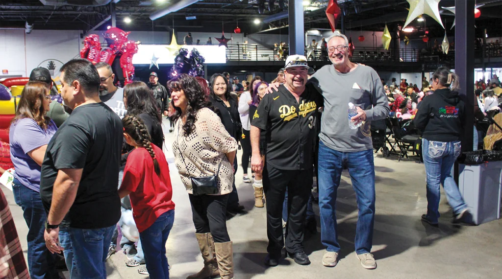 IBEW members John Romero and James Archuleta at Local 611’s family Christmas party.