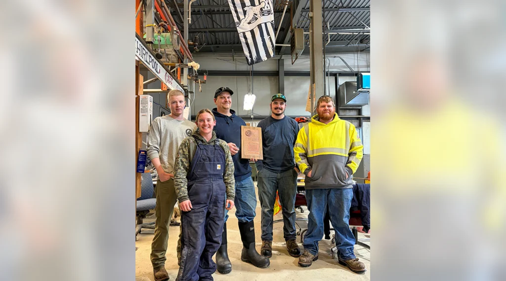 Morrisville Water and Light Local 300 members celebrate with Nick Leblanc.