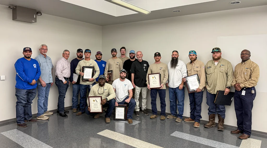Local 66 members, union leadership and company representatives gather following a ceremony recognizing life-saving actions that exemplify the highest standards of safety, training and brotherhood.