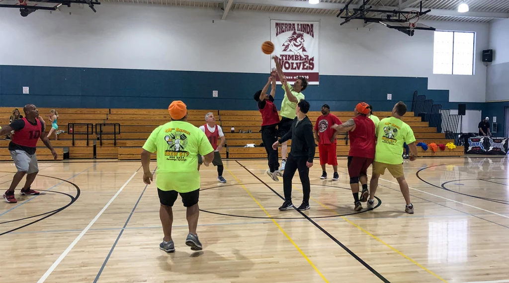 Local 617 members on the court during the March Madness Tournament.